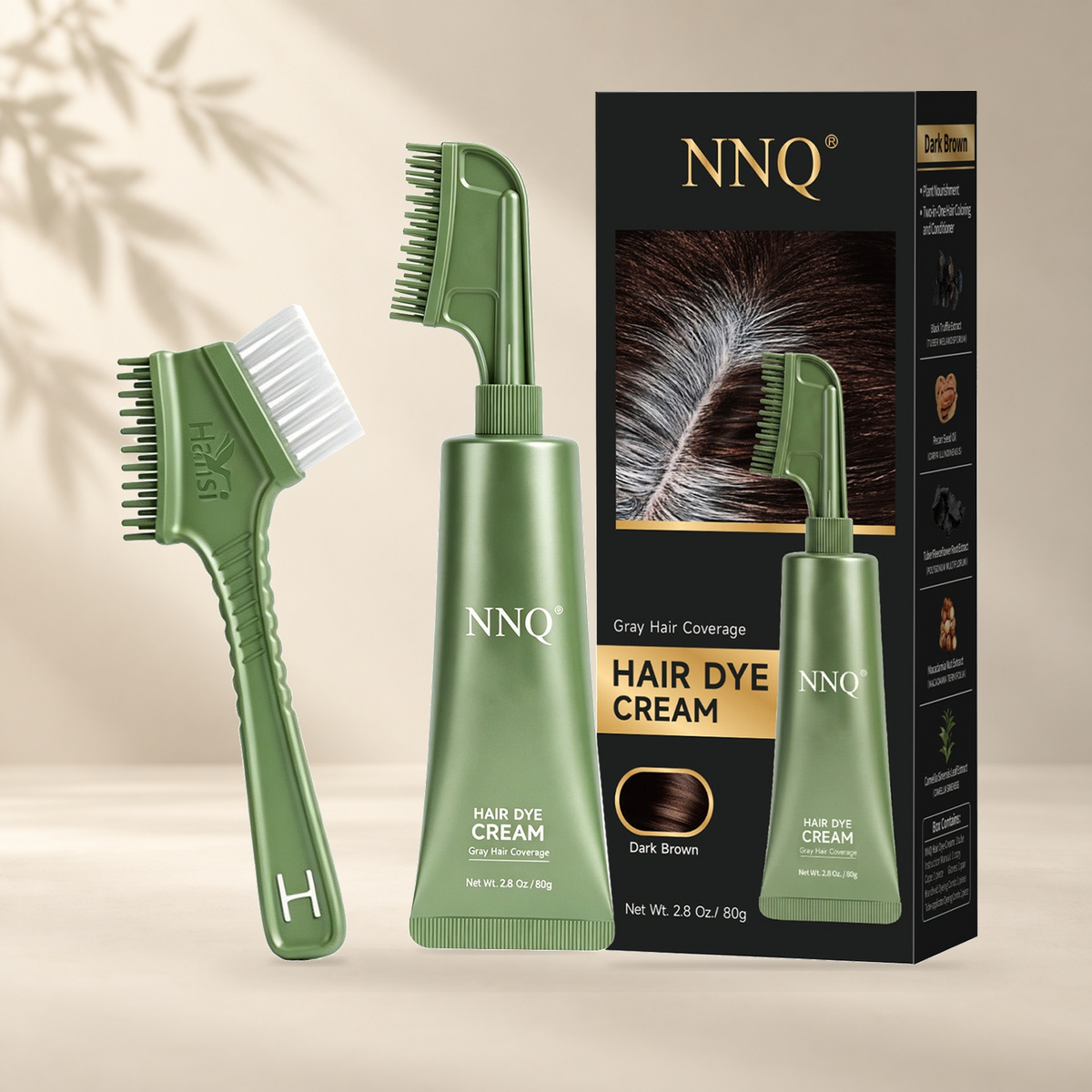 NNQ Dark Brown 80 g hair dye cream, comb applicator and retail box; original product photograph on warm ivory background.